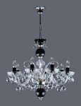General view of a black and white crystal chandelier with silver metal.