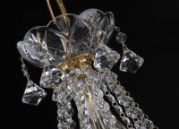 The upper part of the pyramid chandelier - fixing the crystal chains