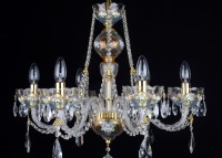 The upper part of the ceiling lamp with an artistic painting