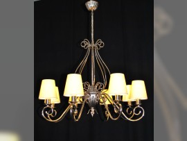 The custom-made silver tubular chandelier with yellow textile 8  lampshades