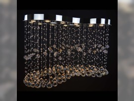 hiny silver design of a larger 12-bulb chandelier - dark background