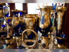 Cobalt glass with the same flowers made of molten glass