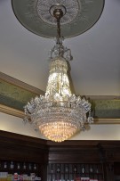 Antique chandelier washing - Fragner's pharmacy Prague